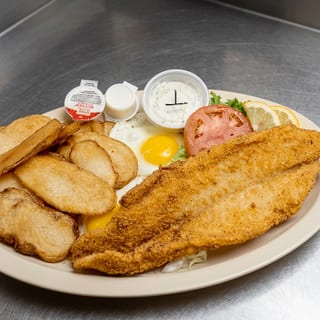 Two Eggs with Hand Breaded Filet of Catfish